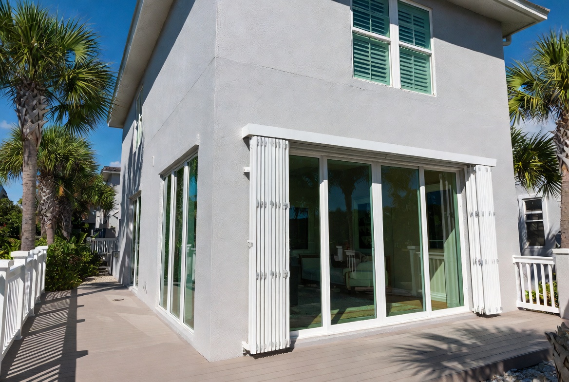 Accordion hurricane shutters deployed on Florida home during storm season