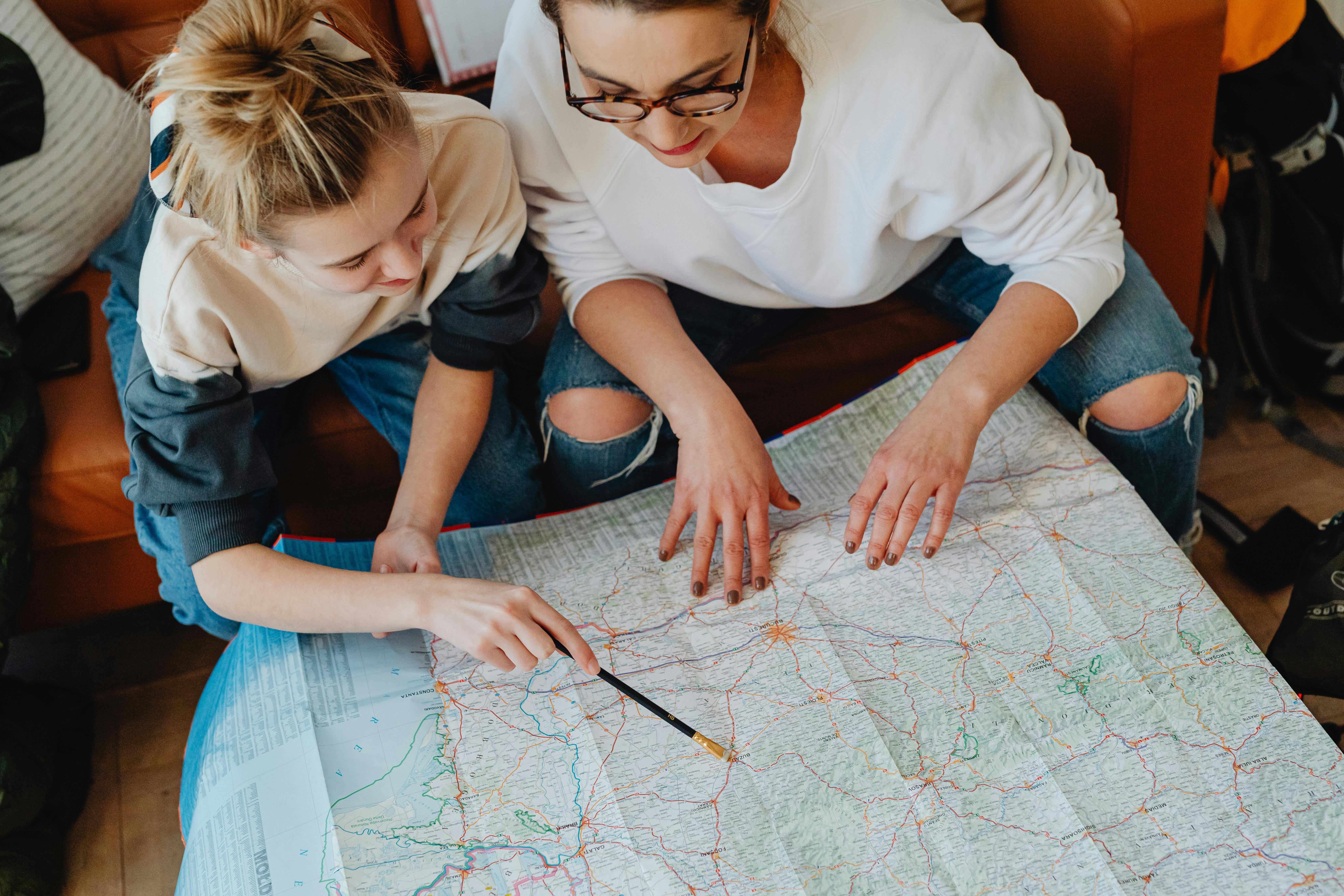 Family studying evacuation route map